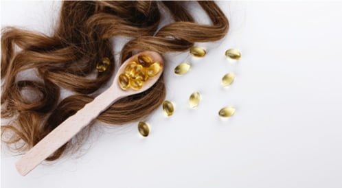 فوائد زيت فيتامين e للشعر